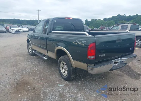 2002 Ford F150 из США, поврежденный, VIN 1FTRX18W02KA29930